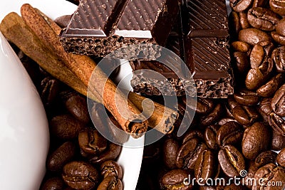 Chocolate, coffee beans, cinnamon sticks Stock Photo