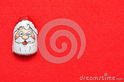 A chocolate covered with Santa Clause face wrapper Editorial Stock Photo