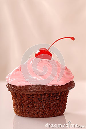 Chocolate cupcake with pink buttercream Stock Photo