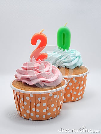 Chocolate Cupcakes with Candles 20 on White Background Stock Photo