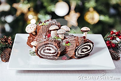 Traditional Christmas dessert called Yule log or bÃ»che de NoÃ«l Stock Photo