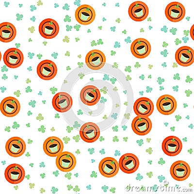 Chocolate cupcakes on orange plates with shamrock Stock Photo