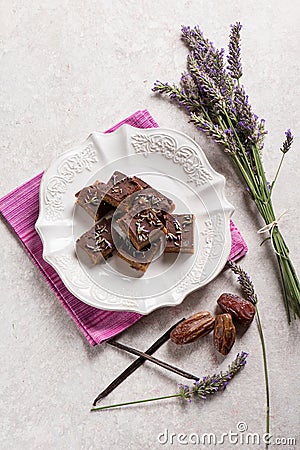 Chocolate with dares and lavender flower Stock Photo