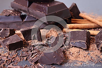 Chocolate. Delicious sweets. Broken pieces of chocolate close-up. Stock Photo