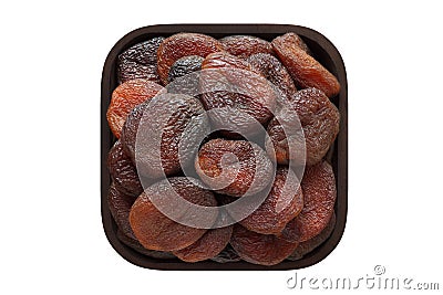 Chocolate dried apricots in square bowl isolated on white background. organic food, top view Stock Photo