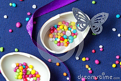 Chocolate Easter Eggs with colored sweet decorated Stock Photo