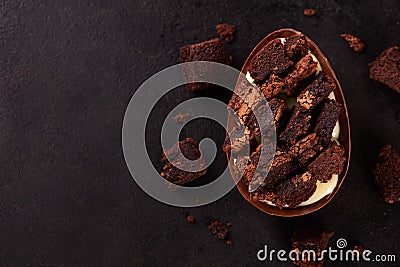 Chocolate egg with filling of brownie for Easter Stock Photo