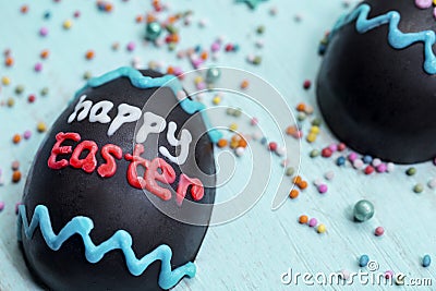 Chocolate egg with happy Easter text Stock Photo