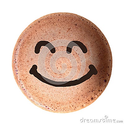 Chocolate foam with smile face isolated on white background. Stock Photo