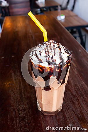 Chocolate frappÃƒÂ© served with whipped cream and chocolate syrup Stock Photo