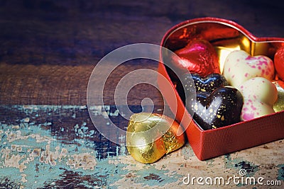 Chocolate gift box for Valentine's day holiday celebration on wooden background Stock Photo