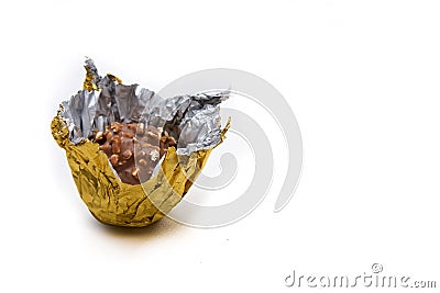 Chocolate in golden wrapping Stock Photo