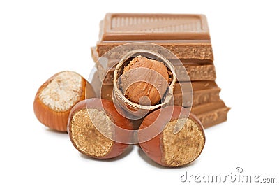 Chocolate and hazelnuts isloted over white Stock Photo