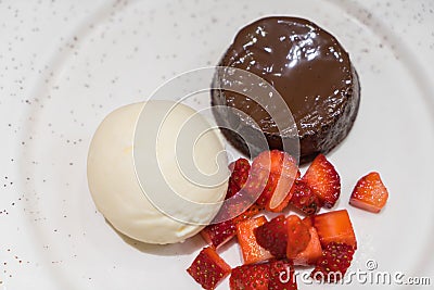 Chocolate lava cake with ice cream . Stock Photo