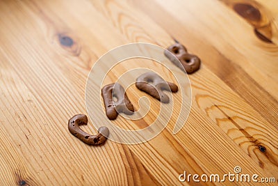 Chocolate letter cookies, written carb Stock Photo