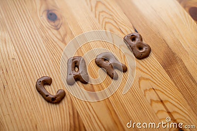 Chocolate letter cookies, written carb Stock Photo