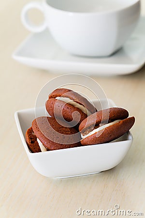 Chocolate marron cookies with nuts cream Stock Photo