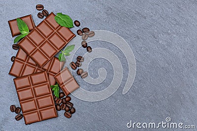 Chocolate milk chocolates bar food sweets slate copyspace top vi Stock Photo