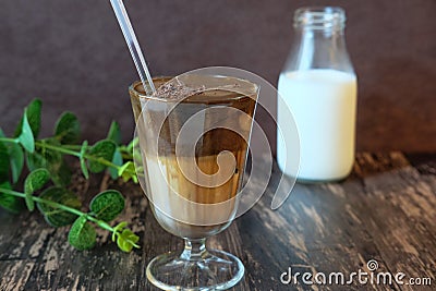 Chocolate milk, milk with shaken whipped cream and chocolate on the top Stock Photo