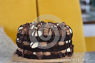 Chocolate mousse cake with layers filled up with white, milk and dark chocolate mousse Stock Photo