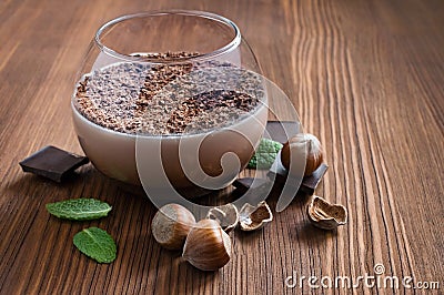 Chocolate mousse dessert with mint and hazelnuts Stock Photo