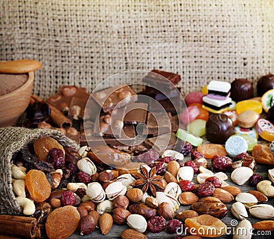 Chocolate nuts dried fruits and candy Stock Photo