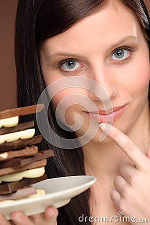 Chocolate - portrait young woman temptation Stock Photo