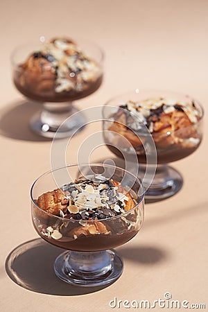 Chocolate profiterole dessert served on a glass Stock Photo