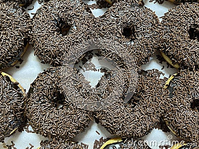 Chocolate rice or chocolate sprinkle doughnuts Stock Photo