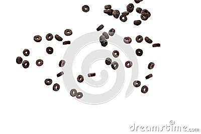Chocolate rings cereal spill out into a bowl. Breakfast Stock Photo