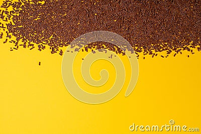 Chocolate Sprinkle Pile, Candy Sprinkles Flakes, Sweet Brown Flakes Glaze Decoration, Chocolate Vermicelli Stock Photo