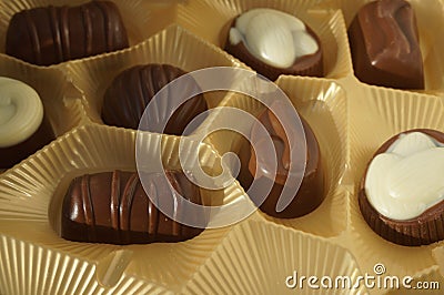 chocolates in gold packaging Stock Photo