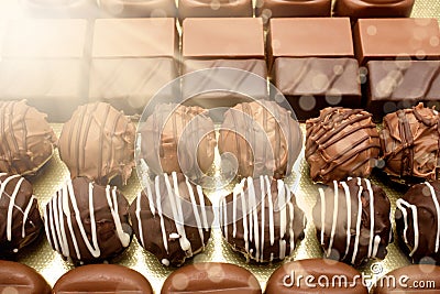 Chocolates and lightbeams Stock Photo