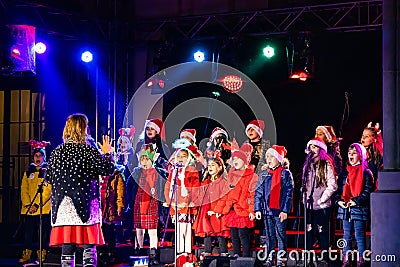 Choir of kids at Classical Christmas Market at the National Opera in Bucharest, Romania Editorial Stock Photo