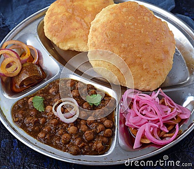 Chole bhature with pickled onions Stock Photo