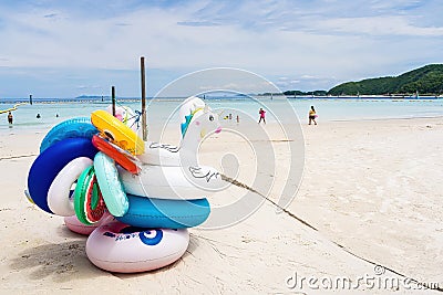 Chon Buri, Thailand - October, 02, 2021 : fancy swim tube on the beach Inflatable duck.Fantasy Swim Ring for Summer sea Trip on Editorial Stock Photo