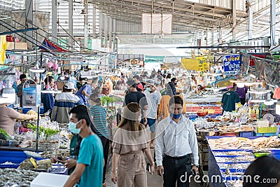Chonburi Province, Thailand - 25 Sep 2020, Asian Local People walk and shop seafood at the Angsila fish market, the large fresh Editorial Stock Photo