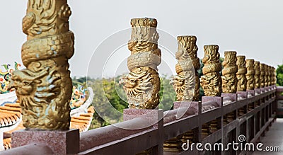 Column pillar at oriental golden hand rail on corridor in Chinese-style temple Stock Photo