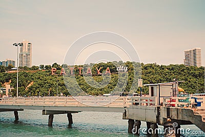 Chonburi, Thailand - July 06 2022 Pattaya sign in the mountain at Bali hai pier with beautiful landscape and cityscape of Pattaya Editorial Stock Photo
