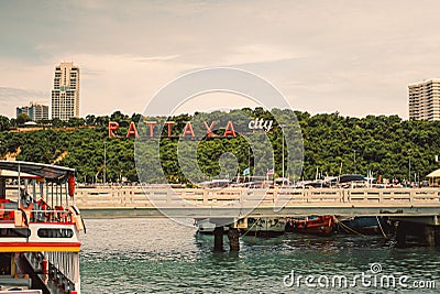 Chonburi, Thailand - July 06 2022: Pattaya sign in the mountain at Bali hai pier with beautiful landscape and cityscape of Pattaya Editorial Stock Photo