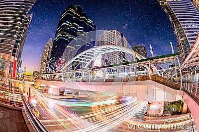 Chong Nonsi skywalk bridge at bkk sky train station on Silom line,Bangkok city at night Stock Photo