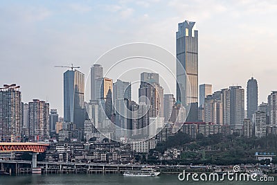 Chongqing, China - Dec 22, 2019: Qian si men bridge over Jialing river by Hong Ya cave, Chinese folk religion village Editorial Stock Photo