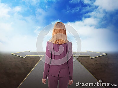 Choose your way. Woman standing at crossroads taking important decision Stock Photo