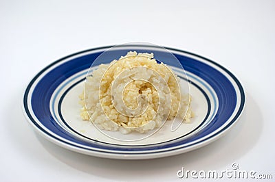 Chopped garlic on plate Stock Photo