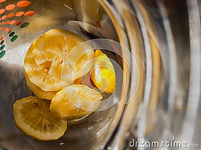 Chopped lemons inside a pitcher Stock Photo