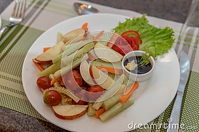 Chopped vegetable and fruit salad Stock Photo