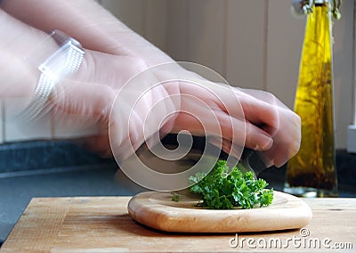 Chopping parsley Stock Photo
