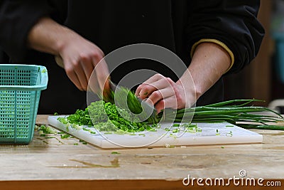 Chopping spring onion, Osaka, Japan Editorial Stock Photo