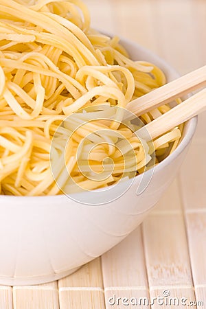 Chopsticks,bowl and noodles Stock Photo