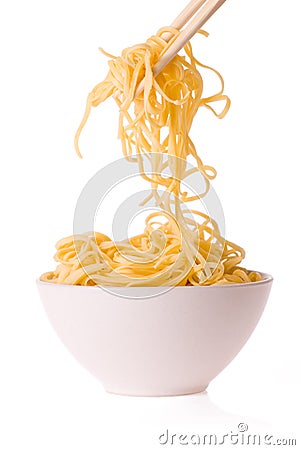 Chopsticks, bowl and noodles Stock Photo